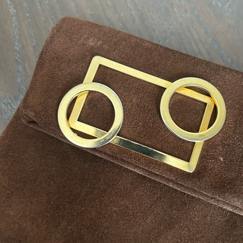 Brown leather clutch with minimalist gold-tone details and gold chain wristlet - Picture 10 of 14